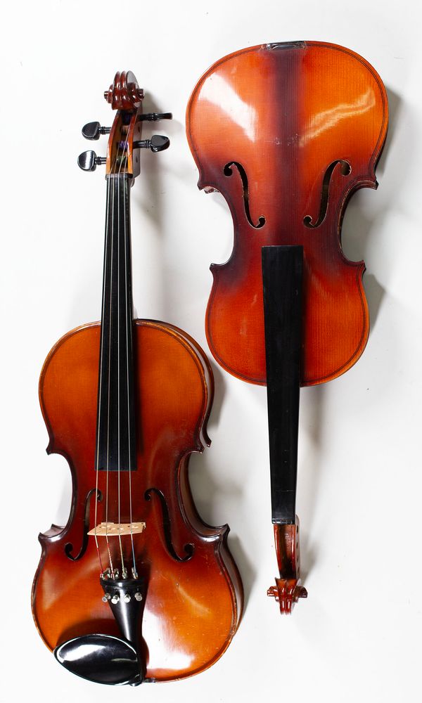 One viola and three violins, varying sizes