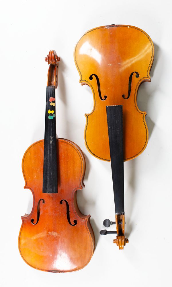 Four violins, varying sizes