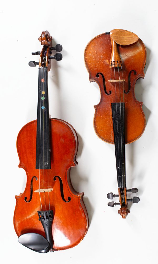 Four violins, varying sizes