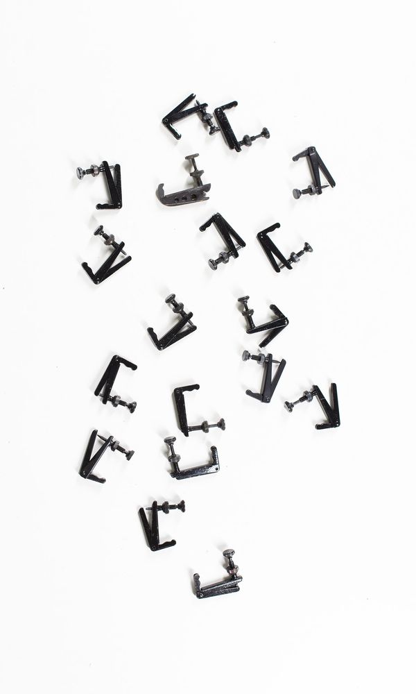 A bundle of eighteen cello fine tuners