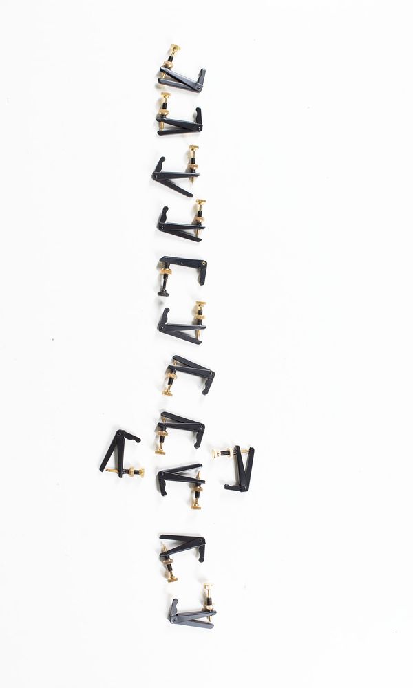A bundle of thirteen cello fine tuners