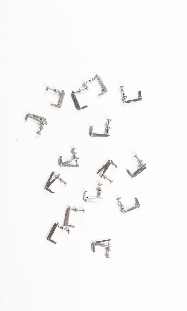 A bundle of fifteen cello fine tuners