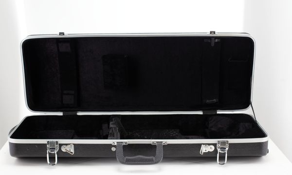 A violin case, unbranded