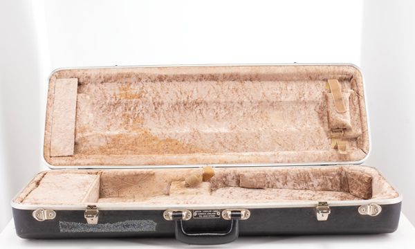 A violin case, branded Hiscox