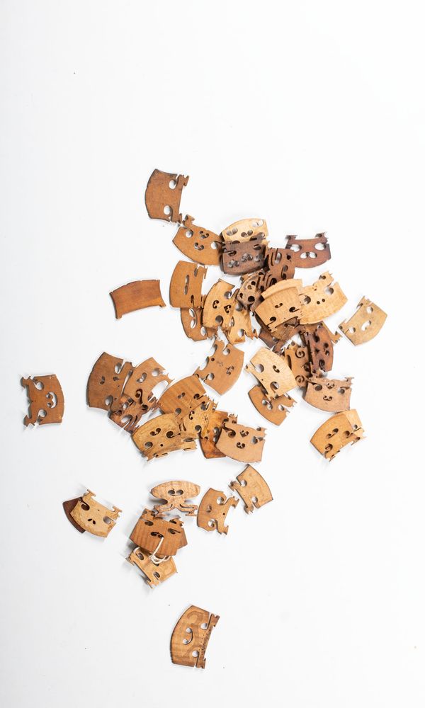 A bundle of violin bridges