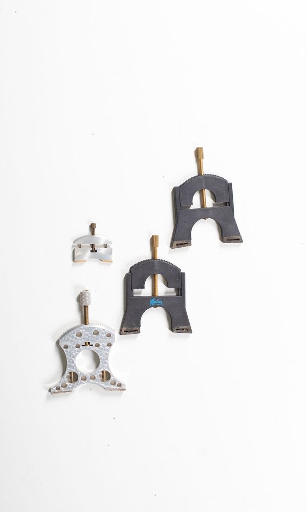 Three cello and one violin bridge lifters
