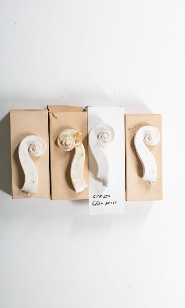 Four Stradivari scroll casts