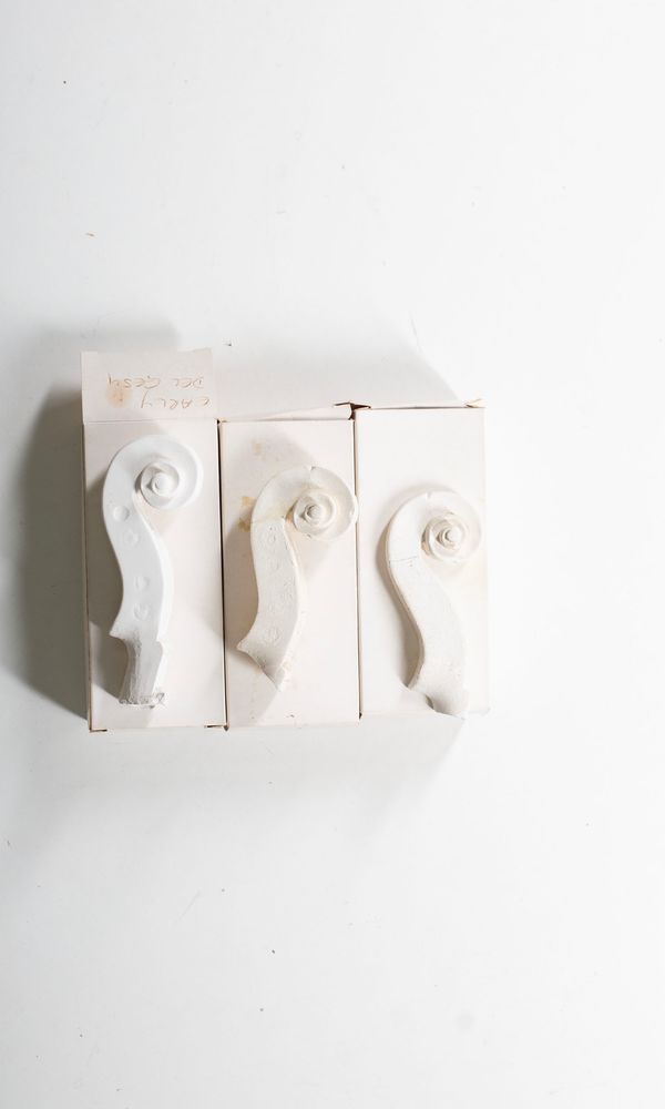 Three Del Gesù scroll casts