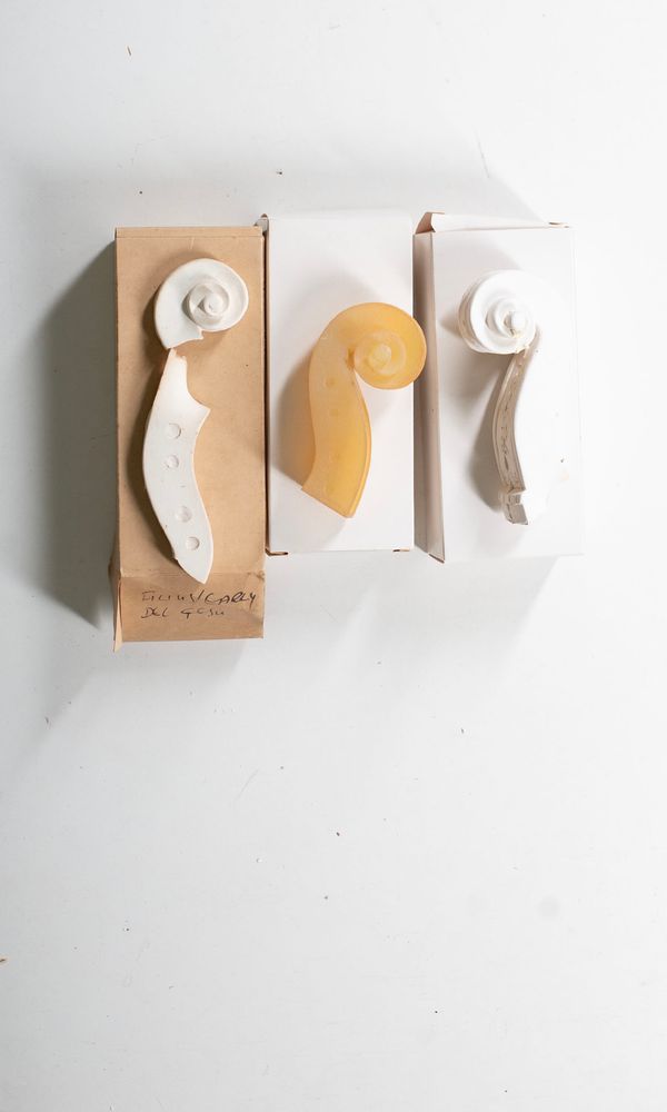 Three Del Gesù scroll casts