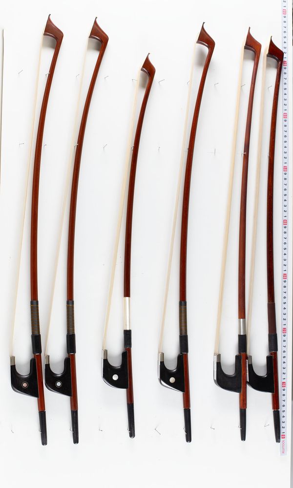 A bundle of six double bass bows, varying sizes
