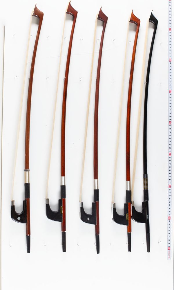 A bundle of six double bass bows, varying sizes