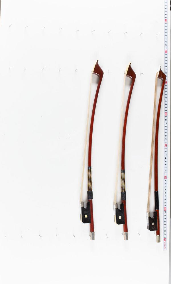 A bundle of three fractional size double bass bows, varying sizes