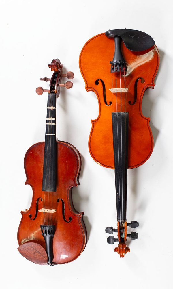 Four violins, varying sizes