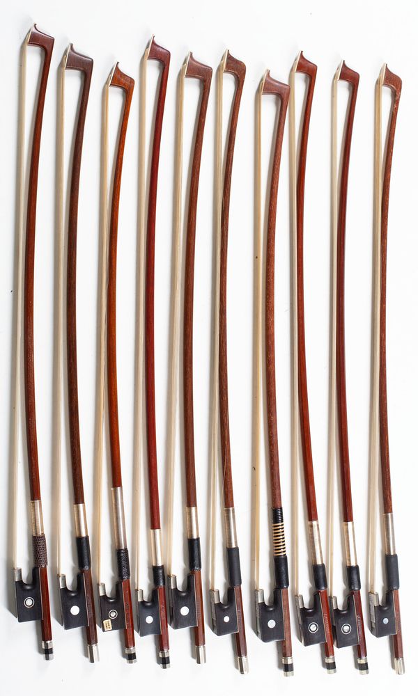 A bundle of ten 1/8 sized violin bows, varying sizes
