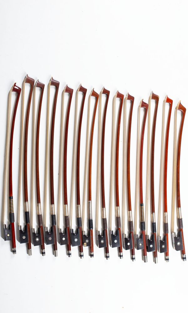A bundle of eighteen 1/16 sized violin bows, varying sizes