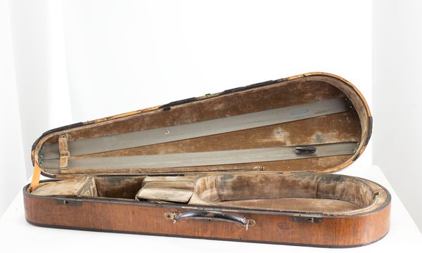 A violin case, branded W.E Hill & Sons