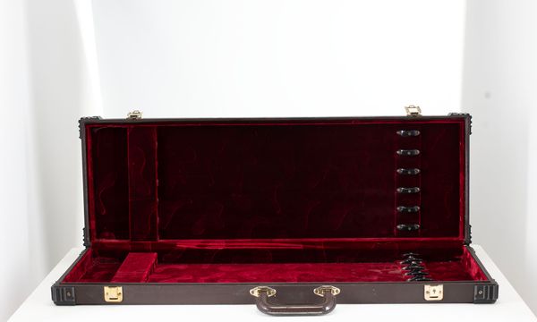 A twelve slot bow case, unbranded