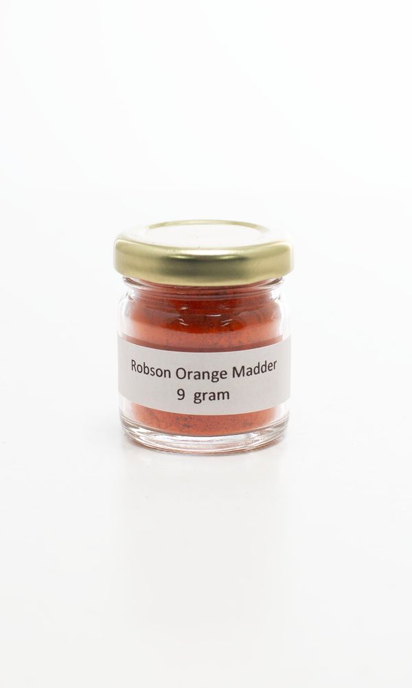 A jar of orange madder