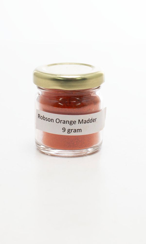 A jar of orange madder