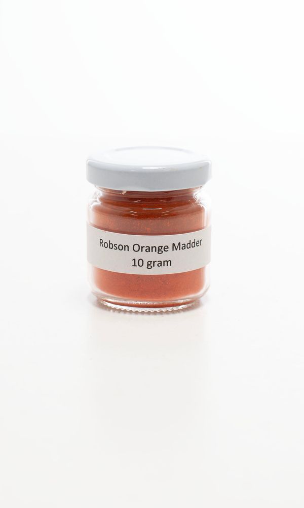 A jar of orange madder