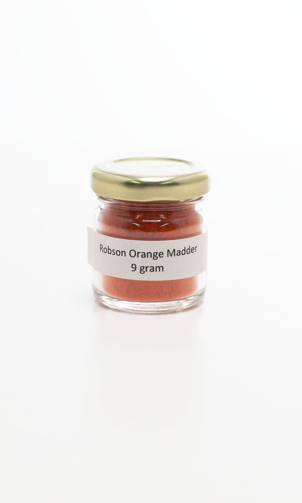 A jar of orange madder