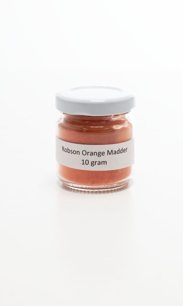A jar of orange madder