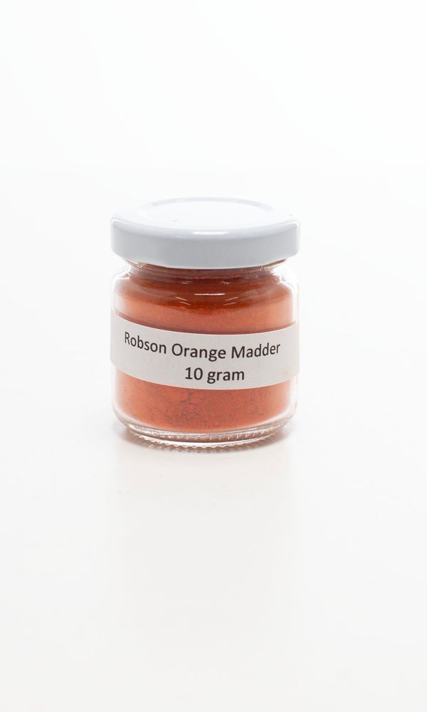 A jar of orange madder
