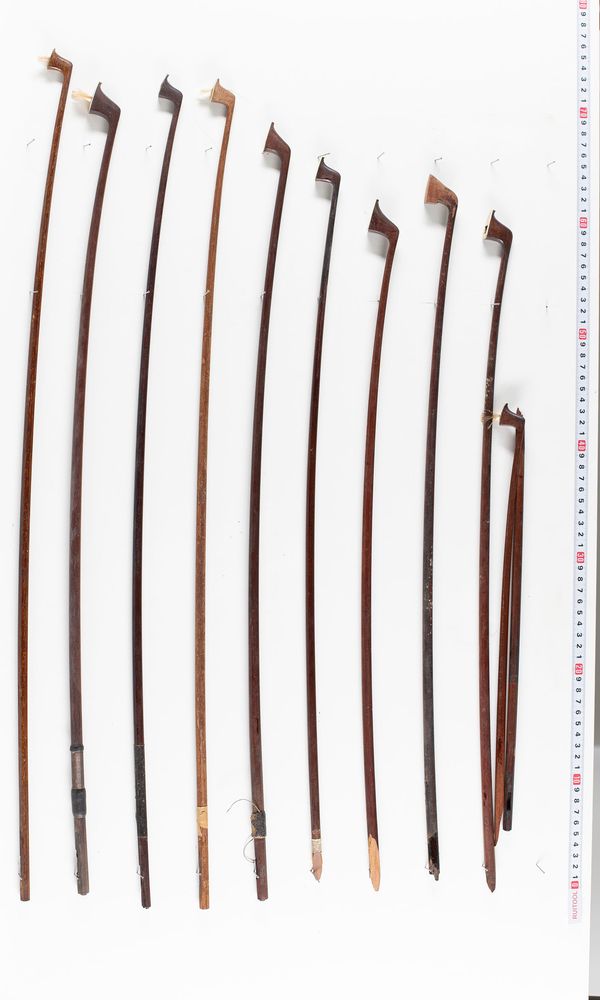 A bundle of twelve bow sticks, varying sizes