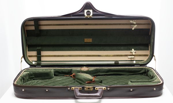 A double violin case, branded Musafia