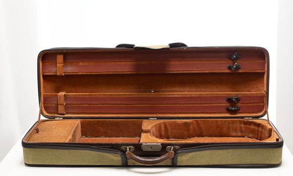 A violin case, branded W. E. Hill & Sons