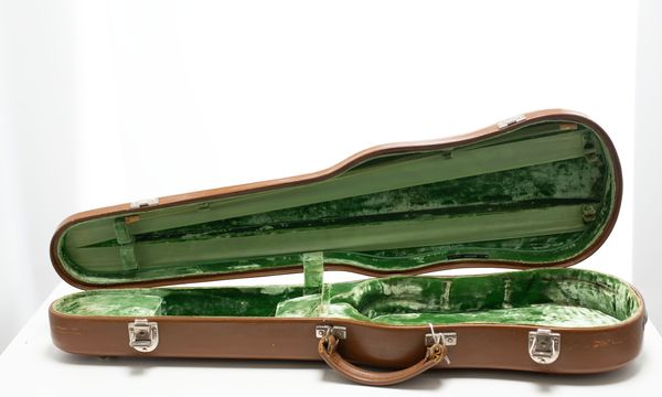 A violin case, labelled Jaeger Etui