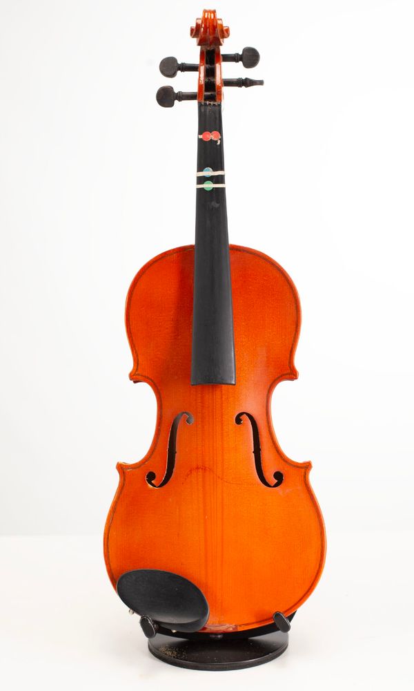Four violins, varying sizes