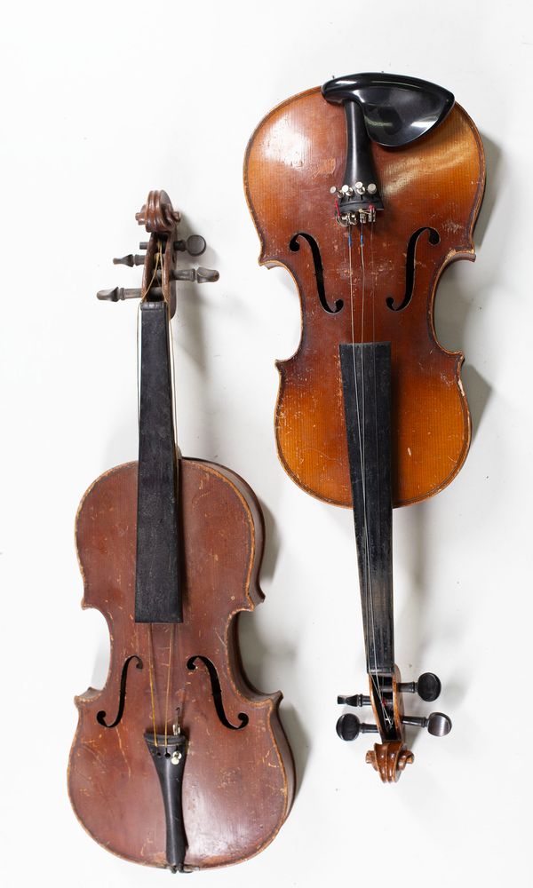 Four violins, varying sizes