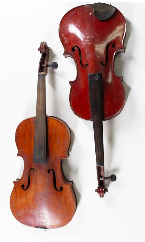 Four violins, varying sizes