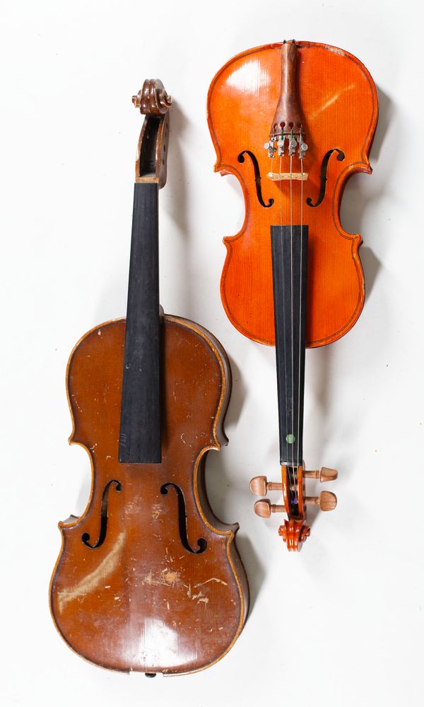 Four violins, varying sizes