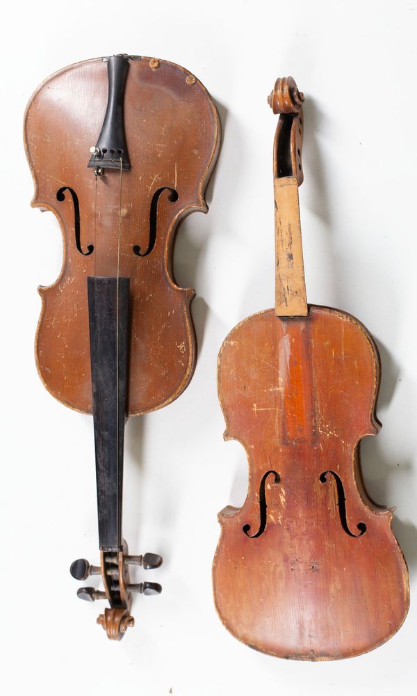 Four violins, varying sizes