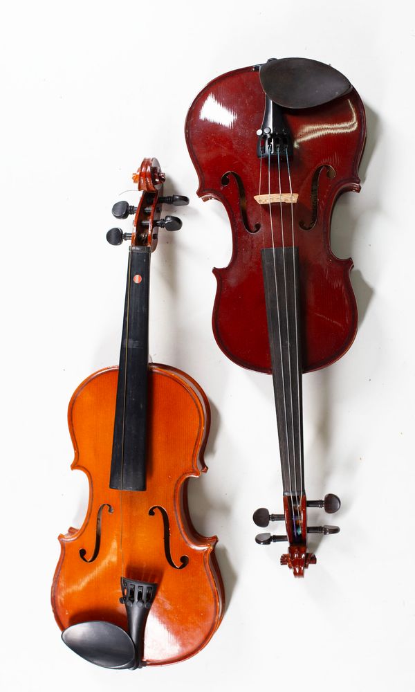 Four violins, varying sizes