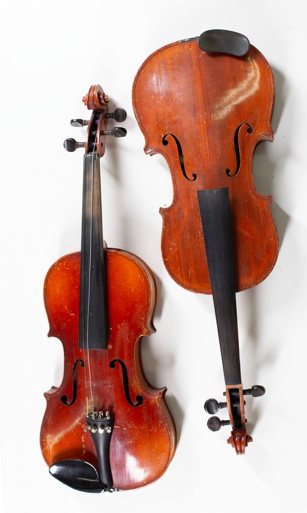 Four violins, varying sizes