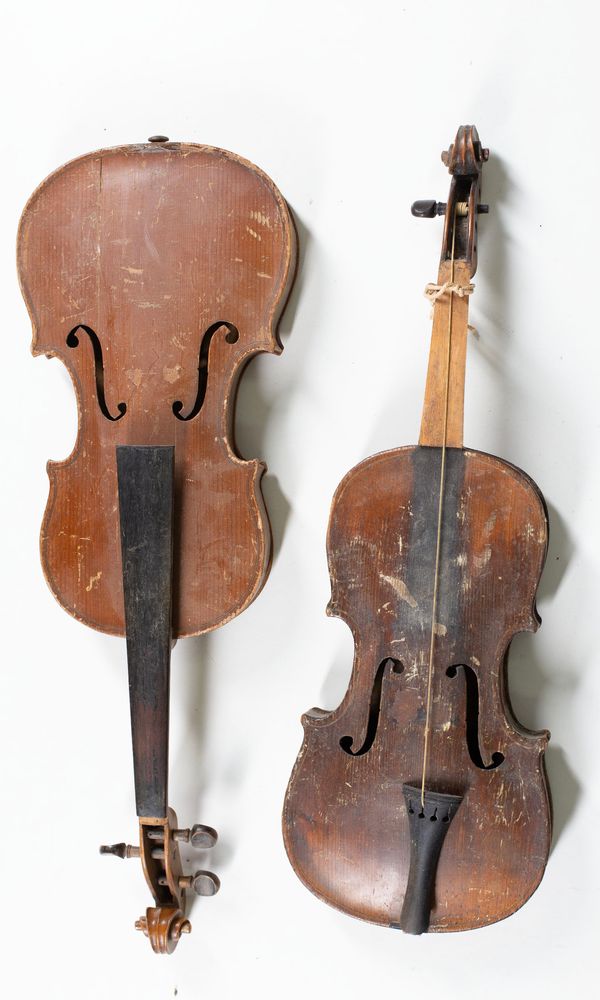 Four violins, varying sizes