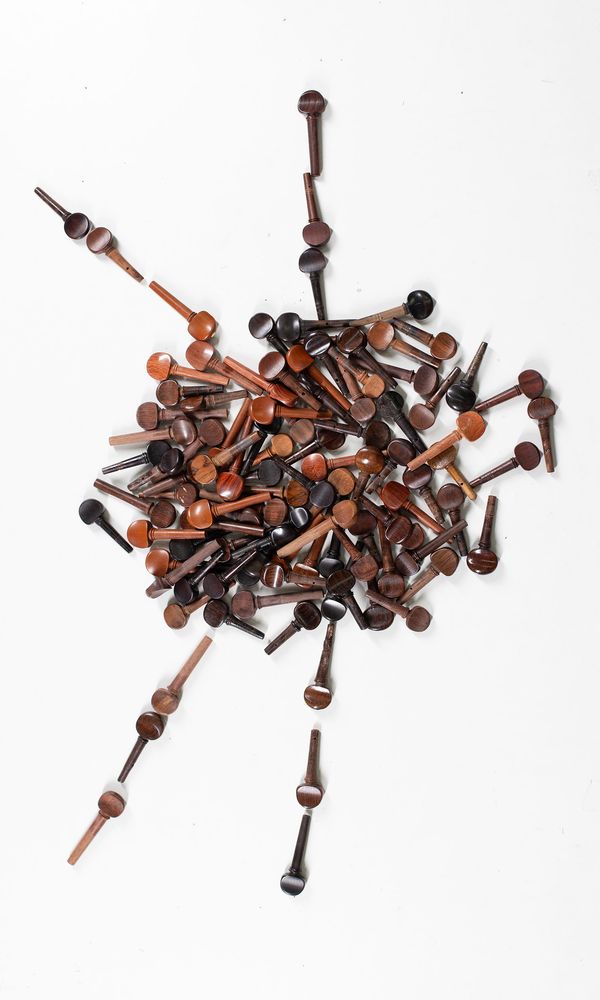 A bundle of one-hundred violin pegs, varying sizes