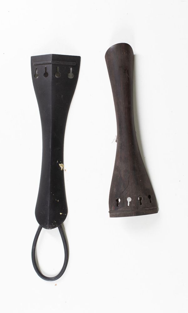 Two double bass tailpieces