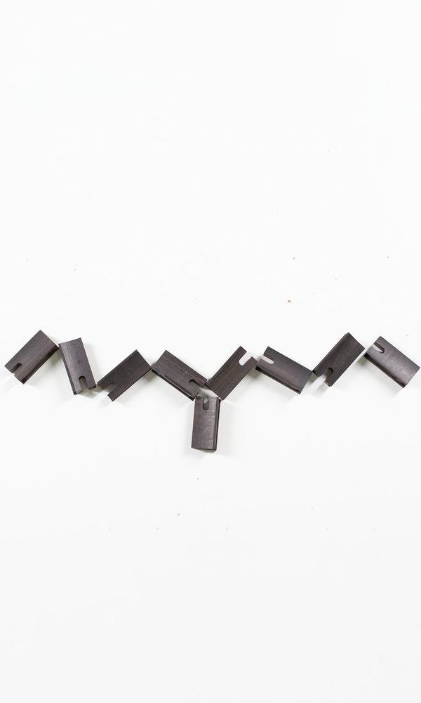 A bundle of nine bow frog blanks