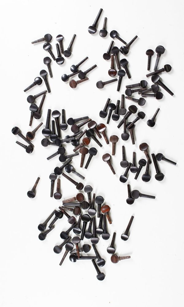 A bundle of one-hundred violin pegs, varying sizes
