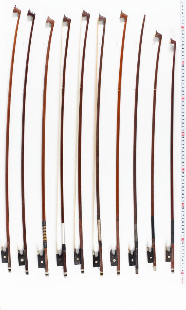 A bundle of fourteen bows, varying lengths