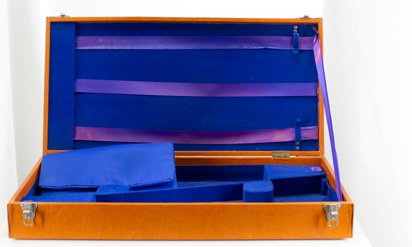 A double violin case, unbranded