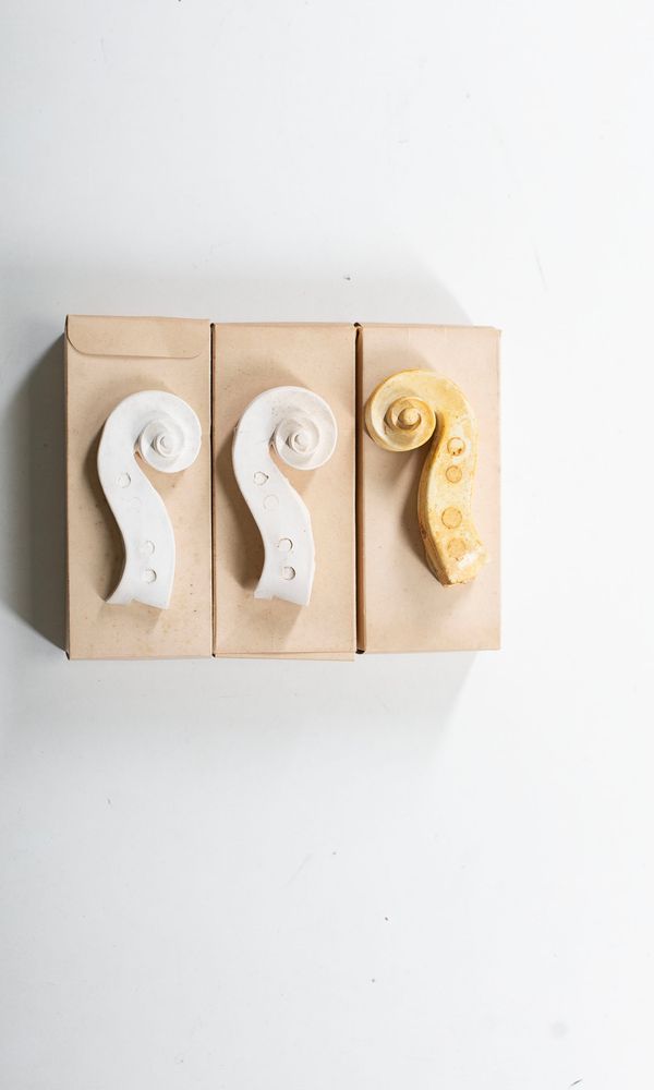 Three Stradivari scroll casts