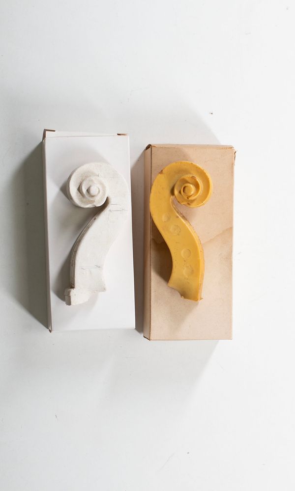 Two Del Gesù scroll casts