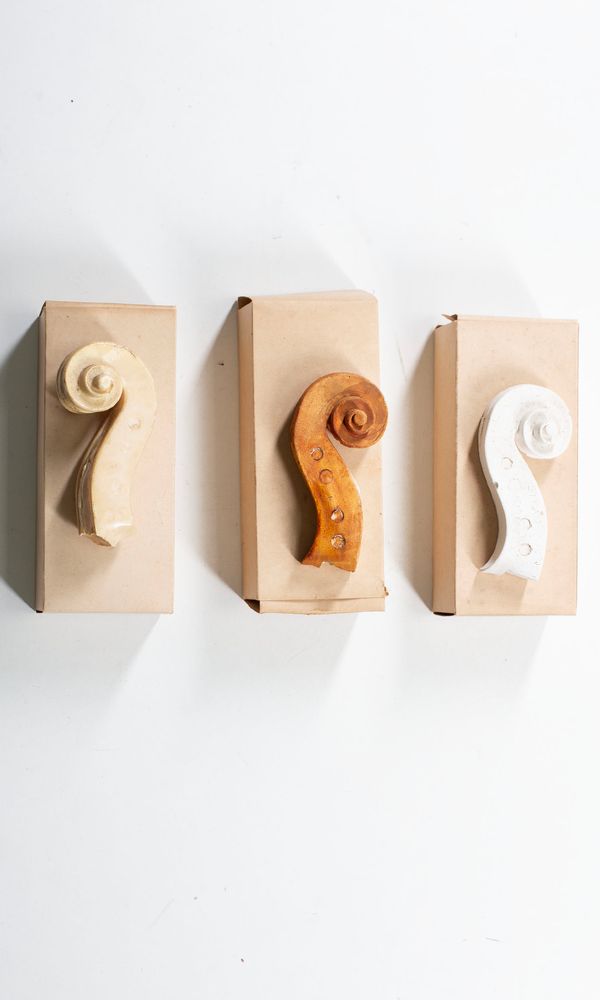 Three Stradivari scroll casts