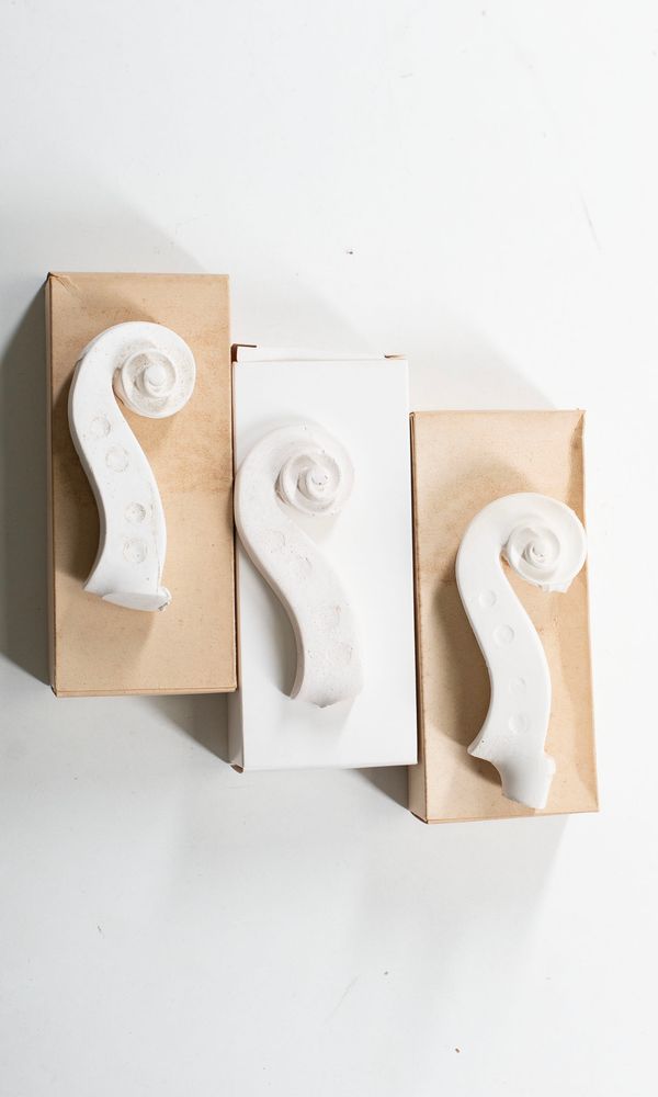 Three Guadagnini scroll casts