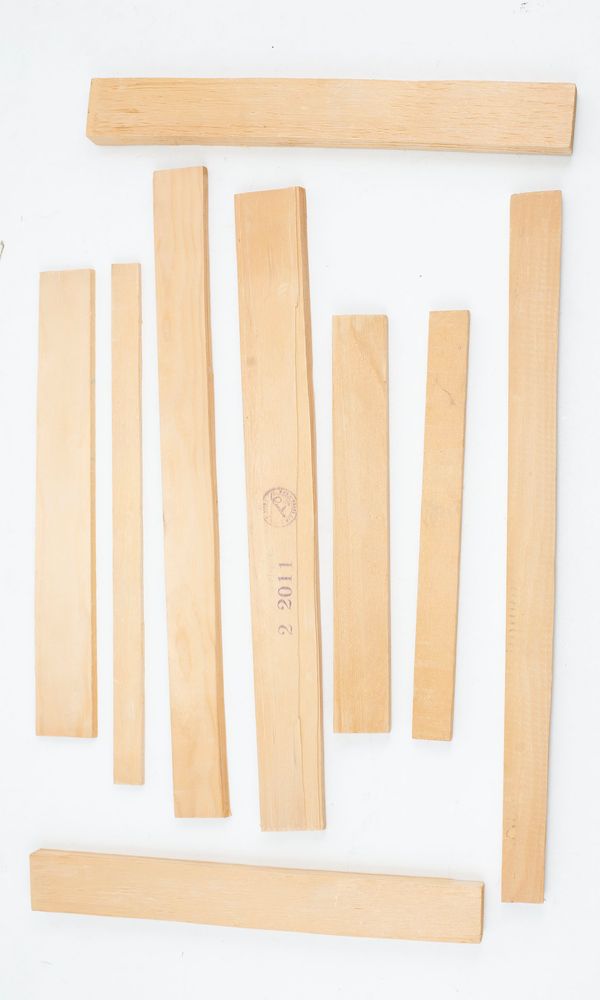 A bundle of violin bass bars, spruce
